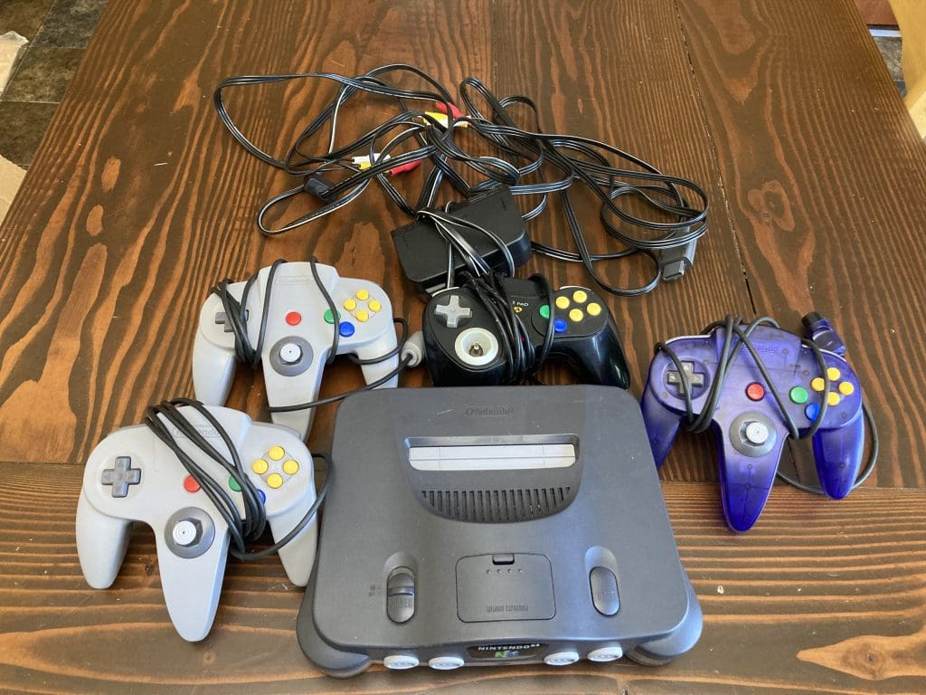 Nintendo 64 console with 4 controllers