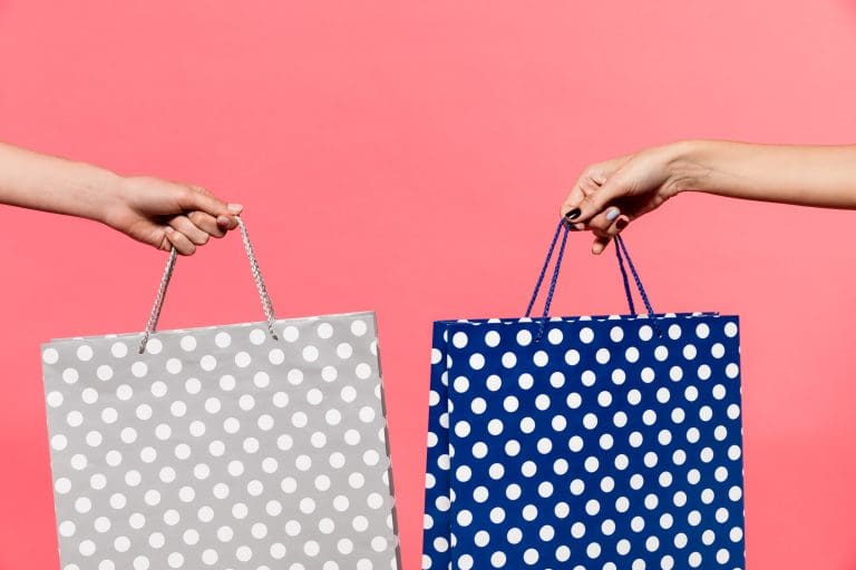 2 Shopping bags on a pink background