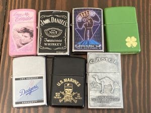 7 Zippo Lighters - Elvis, jack daniels, camel